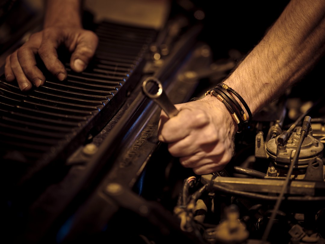Mechanic working on a car engine